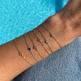I AM HAPPY - SAPFIRA Bracelet  “Joy is the essence of my being”“I have the power to shape my ideal reality”"I'm supposed to live a happy life"Yellow Sapphire is the stone of prosperity and success, fiery and energetic, it will help you achieve all those big dreams you have.A feminine bezel set bracelet in solid 14k gold.One size with three hooks at 14.5 cm, 16 cm and 18 cm