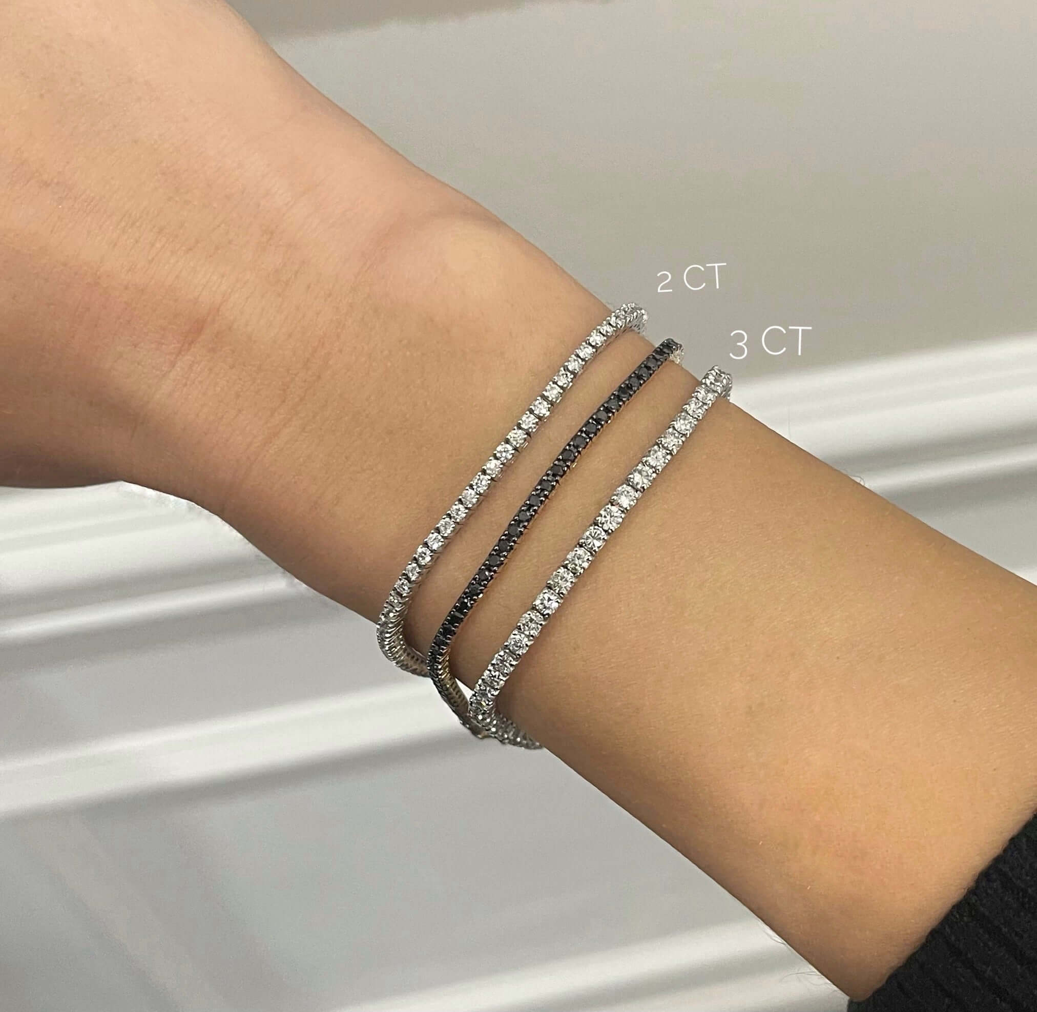 DIAMOND TENNIS BRACELET - SAPFIRA Bracelet  Brilliant cut diamonds are set in this classic four prong tennis bracelet. This delicate tennis bracelet uses minimal metal to allow the diamonds to stand out without a heavy metal appearance.Available in 18k white goldPlease contact us for custom sizes, qualities