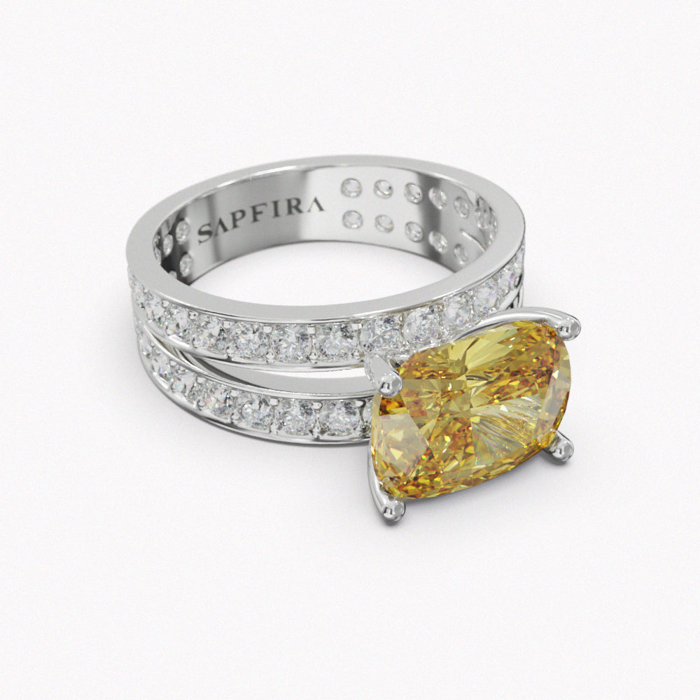 SAPPHIRE RING - SAPFIRA gold Ring  Yellow Sapphire Ring in 18k white gold. Diamonds pave 1.50 ct Central stone: 4.6 ct Yellow Sapphire brings the wisdom of prosperity, not only by attracting wealth and financial abundance into one’s life, but in its ability to manifest one’s creative energy into form through action.