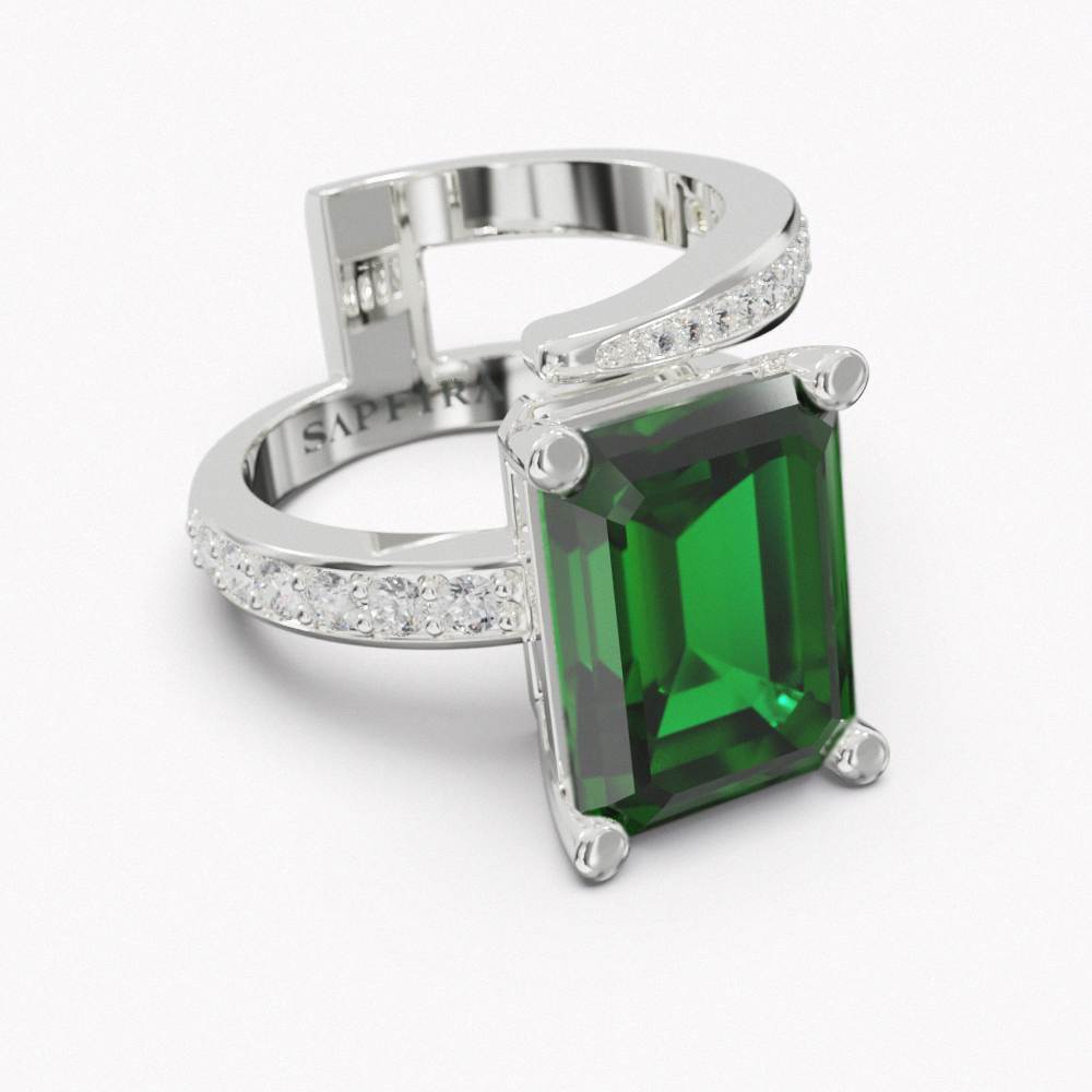 TOURMALINE COCKTAIL RING - SAPFIRA gold Ring  Our White Gold 18K Green Tourmaline & Diamond Ring crafted from 18 karat white gold, its sleek design features a captivating green tourmaline center stone flanked by pavé diamonds. With its minimalist yet sharp lines, this ring effortlessly combines contemporary style with timeless elegance, perfect for making a refined statement on any occasion.