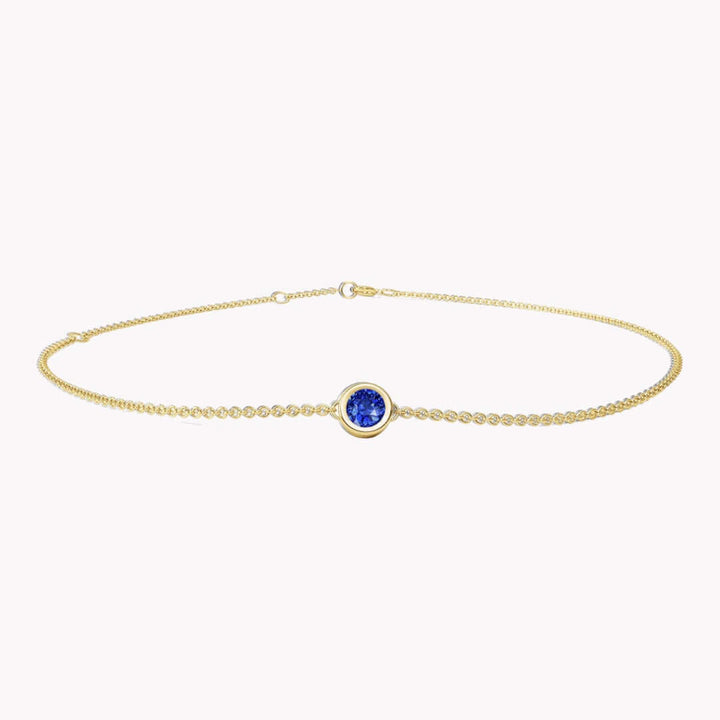 I'M CONFIDENT - SAPFIRA Bracelet  "I know what I'm worth""I know I'm the best at what I do""I'm confident"Blue sapphire represents mental focus and discipline. It is a stone that can help you move your mind away from negative paths.A bezel set bracelet in solid 14k gold.One size with three hooks at 14.5 cm, 16 cm and 18 cm