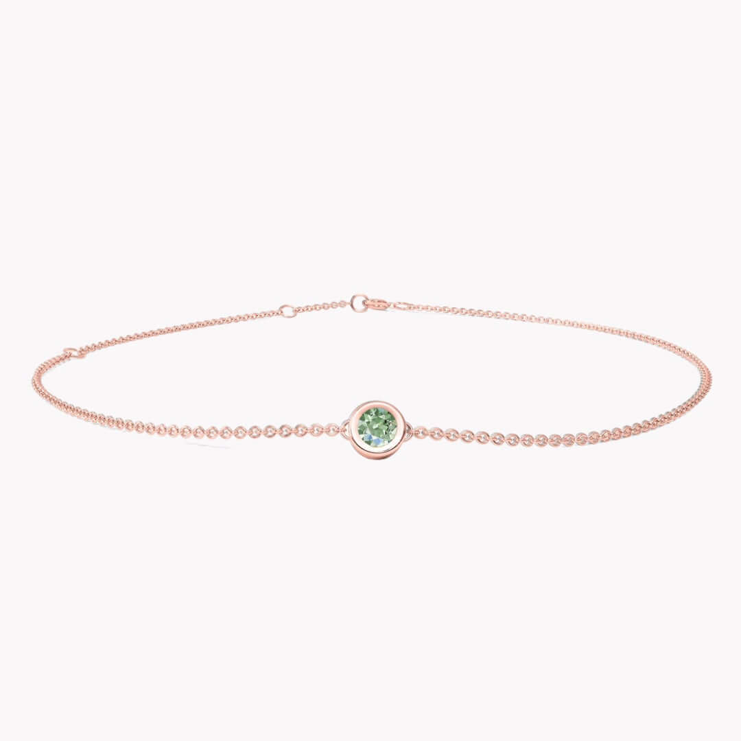 I AM HEALTHY - SAPFIRA Bracelet  “I am healthy, happy and radiant”“I am surrounded by a healthy environment”“I feel dynamic”Stone of tranquility, green sapphire, will bring joy and lightness to your life. As well as restoring balance in your body and mind.A feminine bezel set bracelet in solid 14k gold.One size with three hooks at 14.5 cm, 16 cm and 18 cm