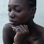 Woman white gold ring on her finger 