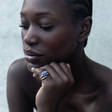 Woman white gold ring on her finger 