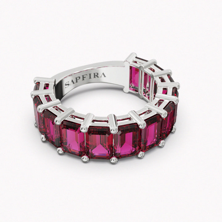 MAGMA - SAPFIRA gold Ring  Rhodolite emerald cut 3/4 ring in 18k white gold. Total carat weight 8.45ct.Rhodolite Garnet is a gemstone for inspiration and emotional healing. It encourages love, kindness, and compassion. Promotes self-esteem and spiritual growth.