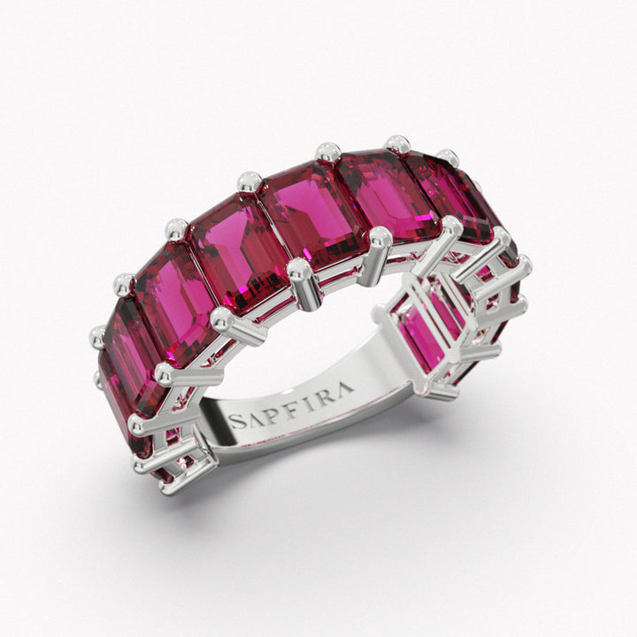 MAGMA - SAPFIRA gold Ring  Rhodolite emerald cut 3/4 ring in 18k white gold. Total carat weight 8.45ct.Rhodolite Garnet is a gemstone for inspiration and emotional healing. It encourages love, kindness, and compassion. Promotes self-esteem and spiritual growth.