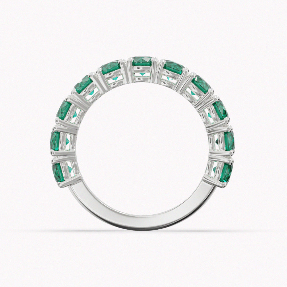 JUNGLE - SAPFIRA gold Ring  Classic emerald ring, 18 karat gold. 3/4 band: 11 Brazilian Emeralds, 3 ct total weight. Width: 4 mm