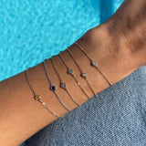I'M CONFIDENT - SAPFIRA Bracelet  "I know what I'm worth""I know I'm the best at what I do""I'm confident"Blue sapphire represents mental focus and discipline. It is a stone that can help you move your mind away from negative paths.A bezel set bracelet in solid 14k gold.One size with three hooks at 14.5 cm, 16 cm and 18 cm