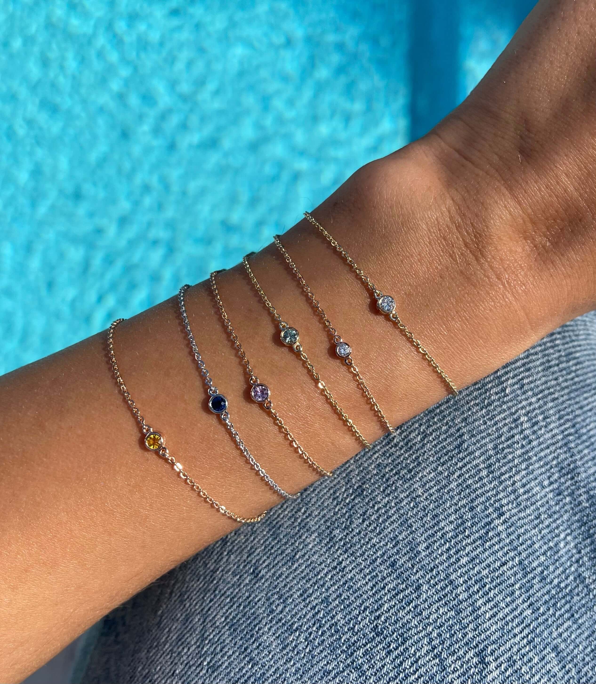 I'M CONFIDENT - SAPFIRA Bracelet  "I know what I'm worth""I know I'm the best at what I do""I'm confident"Blue sapphire represents mental focus and discipline. It is a stone that can help you move your mind away from negative paths.A bezel set bracelet in solid 14k gold.One size with three hooks at 14.5 cm, 16 cm and 18 cm